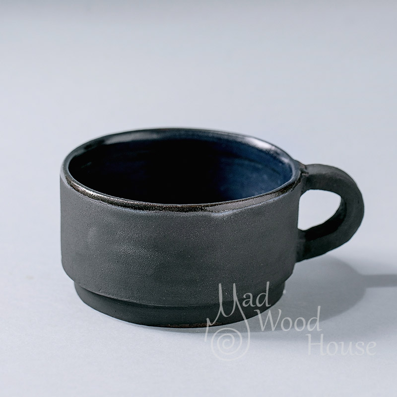 Ceramic cup textured black glaze