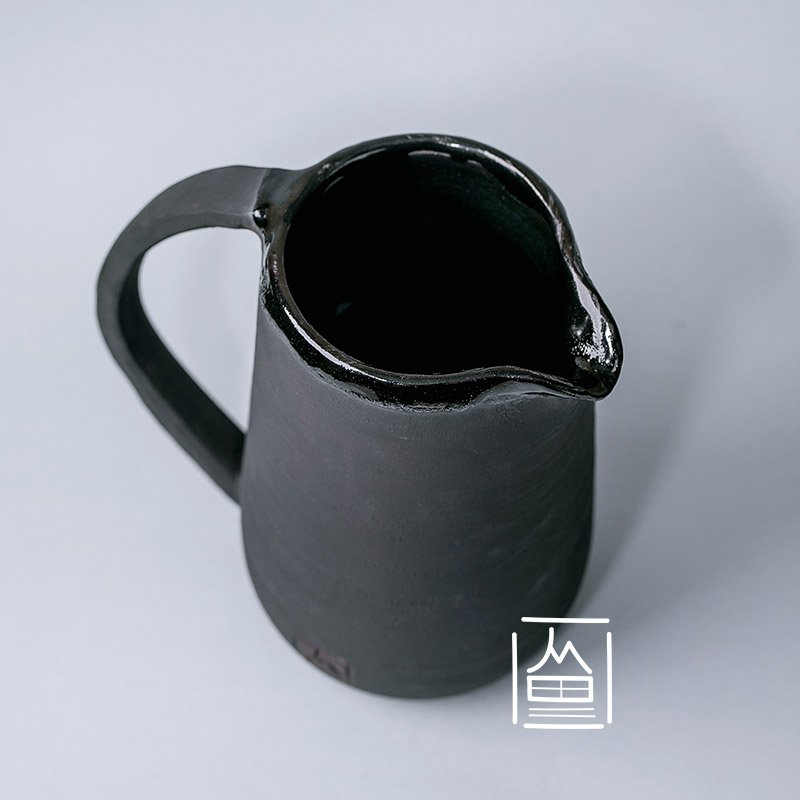 Ceramic pitcher black glaze