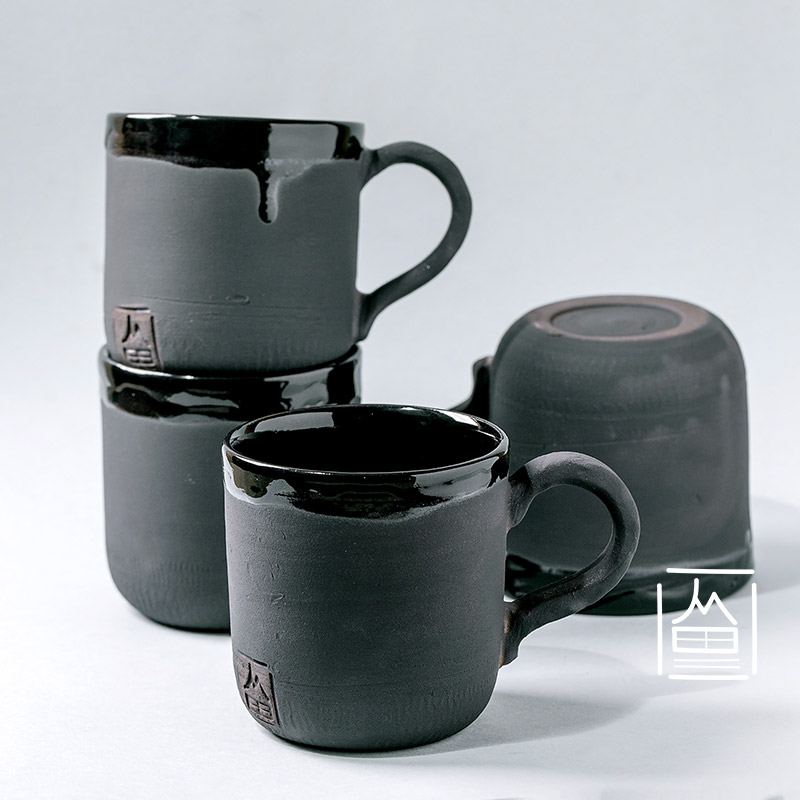 Ceramic cup textured black glaze 1